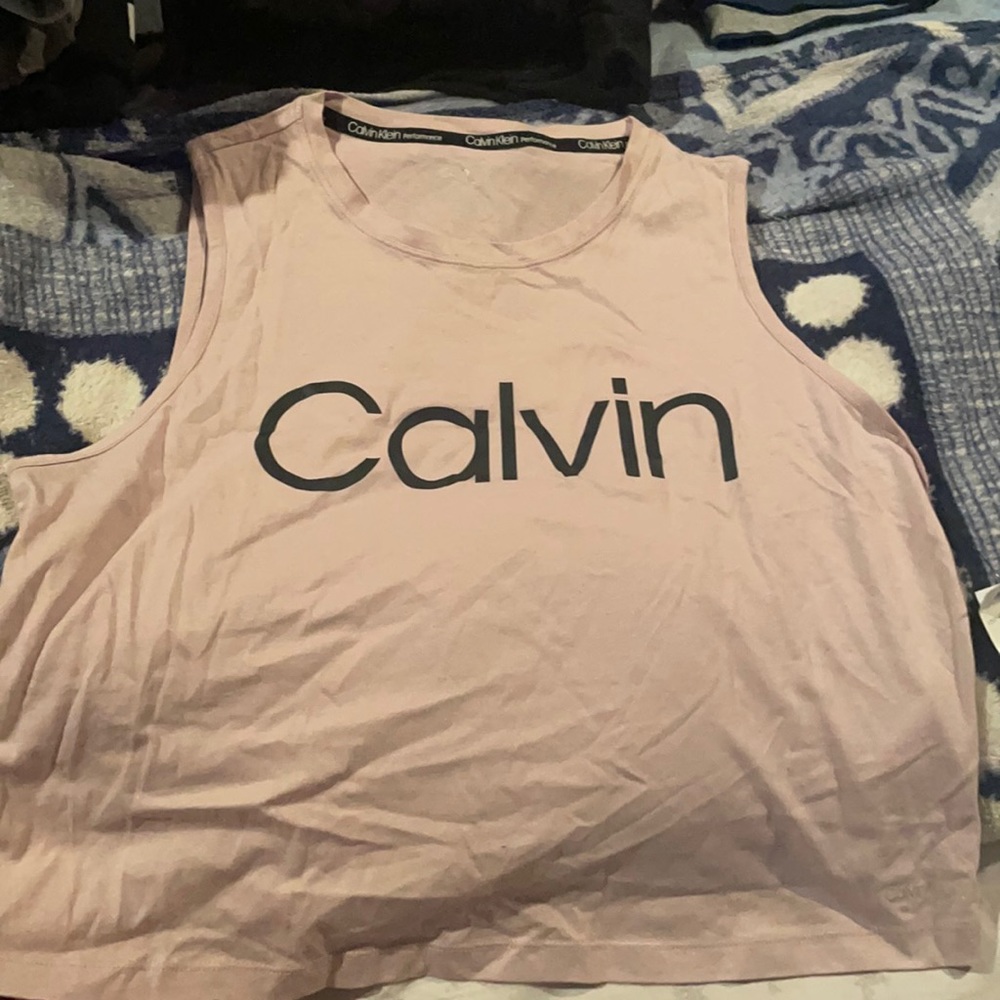A cropped pink tank top Calvin Klein